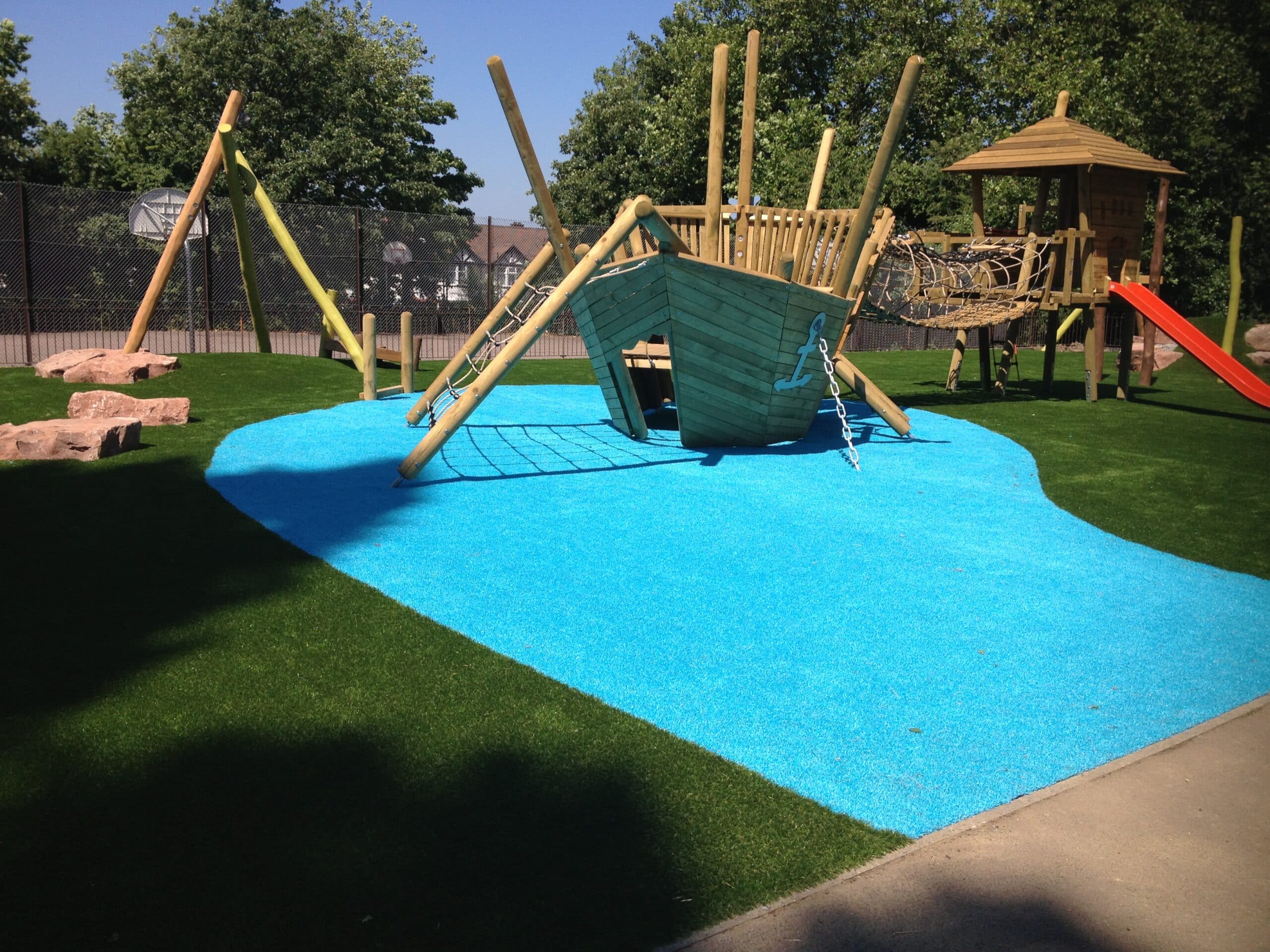 Install of Artificial Grass and Wet Pour